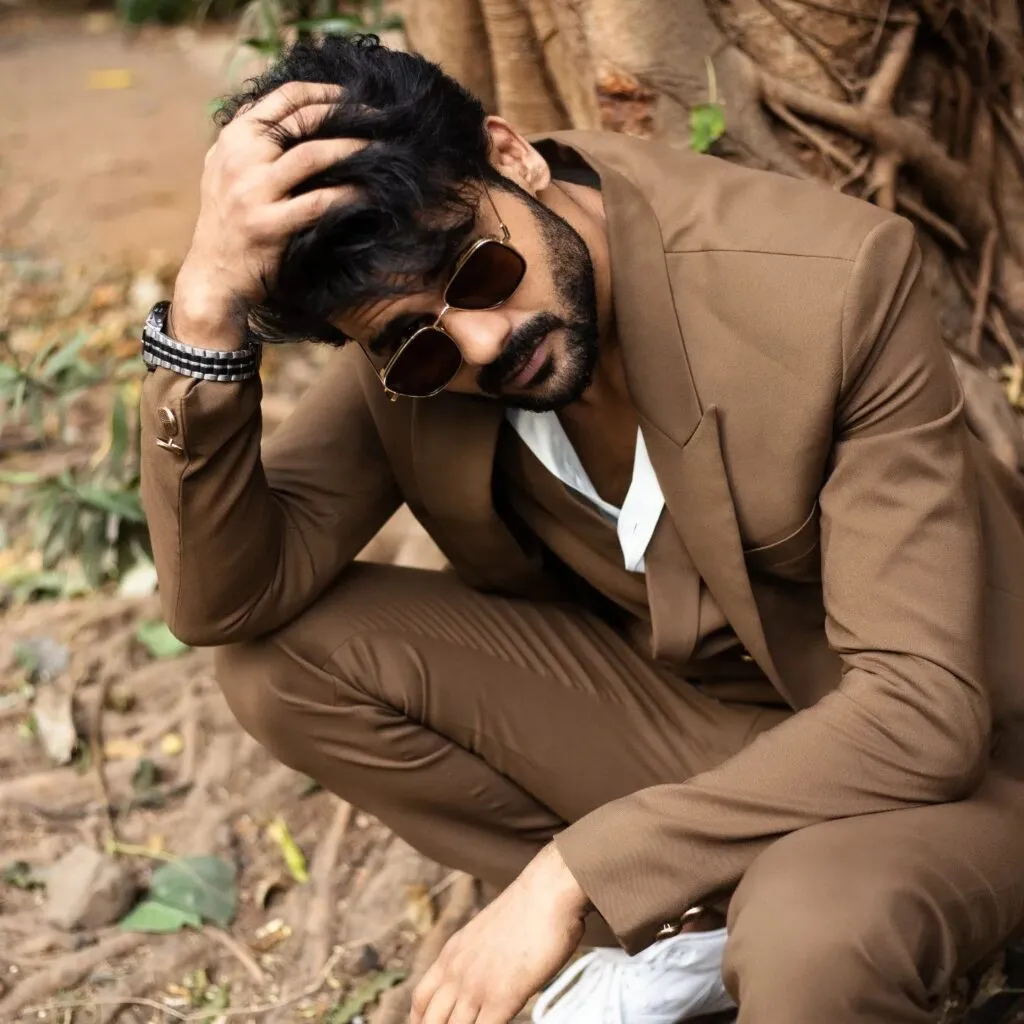 Vishal Aditya Singh in light brown suit with white shirt and goggles posing for camera Vishal Aditya Singh in light brown suit with white shirt and goggles posing for camera - most handsome tv serial actor in india