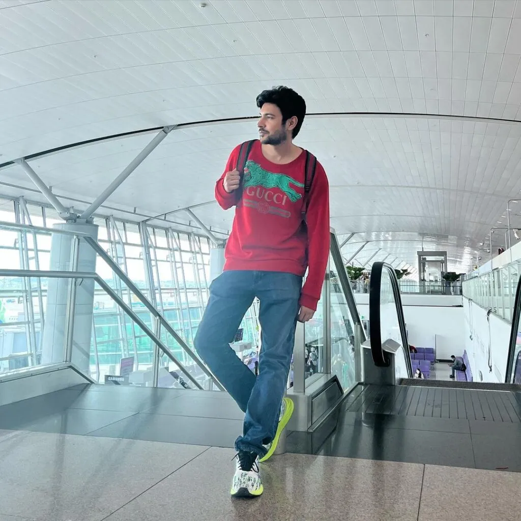 Shivin Narang in red sweat shirt with blue jeans standing near elevators  Shivin Narang in red sweat shirt with blue jeans standing near elevators - most handsome tv serial actor in india