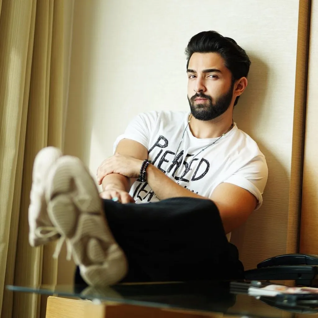 Rohit Suchanti in black jeans with white t-shirt posing for camera Rohit Suchanti in black jeans with white t-shirt posing for camera - hottest actor on indian television
