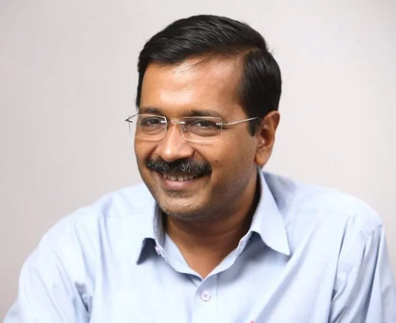 Smiling Arvind Kejriwal in sky blue shirt with spectacles Smiling Arvind Kejriwal in sky blue shirt with spectacles - indian celebrities with diabetes