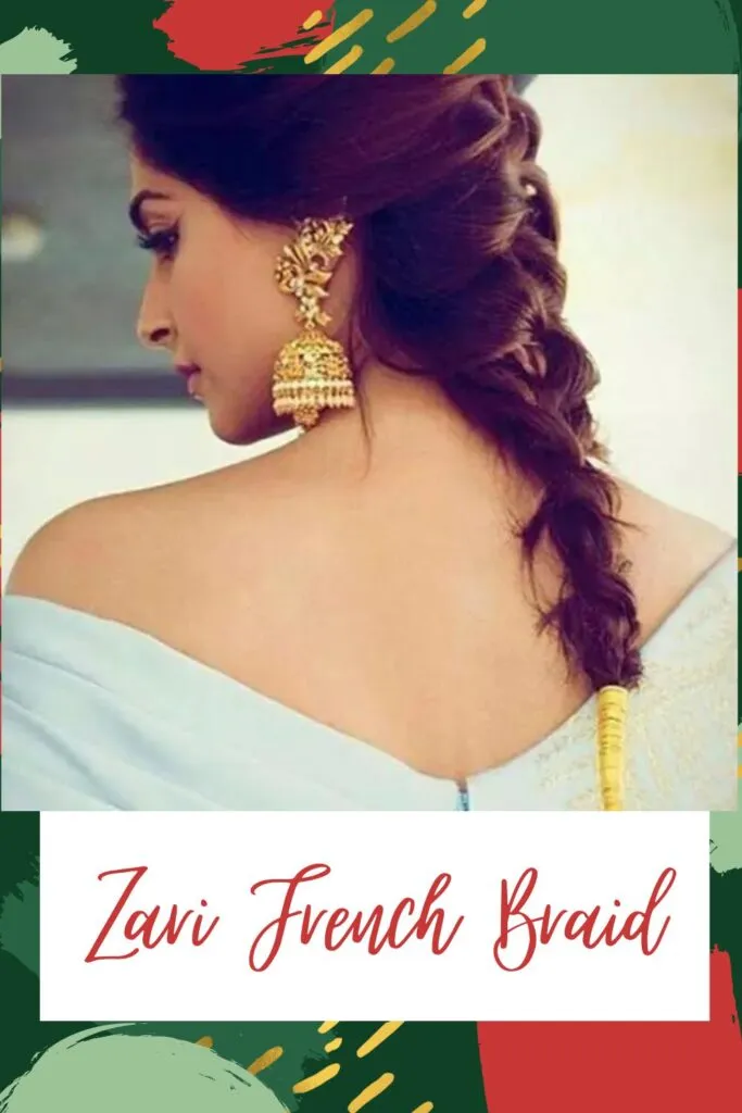 A girl in deep neck sky blue dress and jhumka earrings posing for camera and showing the back view of her zari french braid A girl in deep neck sky blue dress and jhumka earrings posing for camera and showing the back view of her zari french braid - Haircuts for Indian Women
