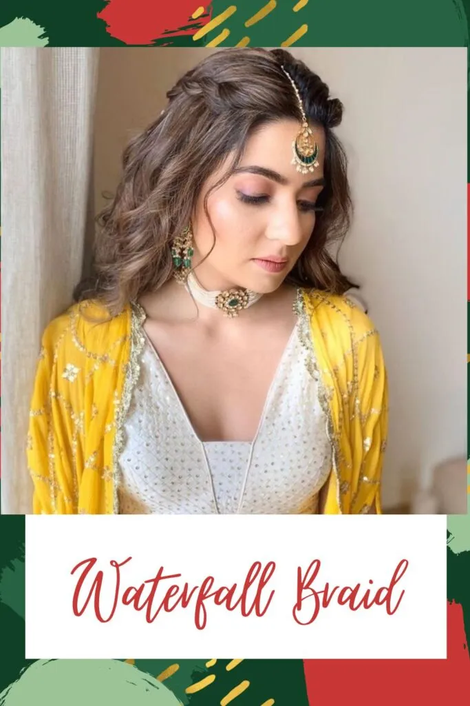 A girl in white and yellow traditional dress with white jewellery showing her Waterfall Braid A girl in white and yellow traditional dress with white jewellery showing her Waterfall Braid - Indian hairstyles for women