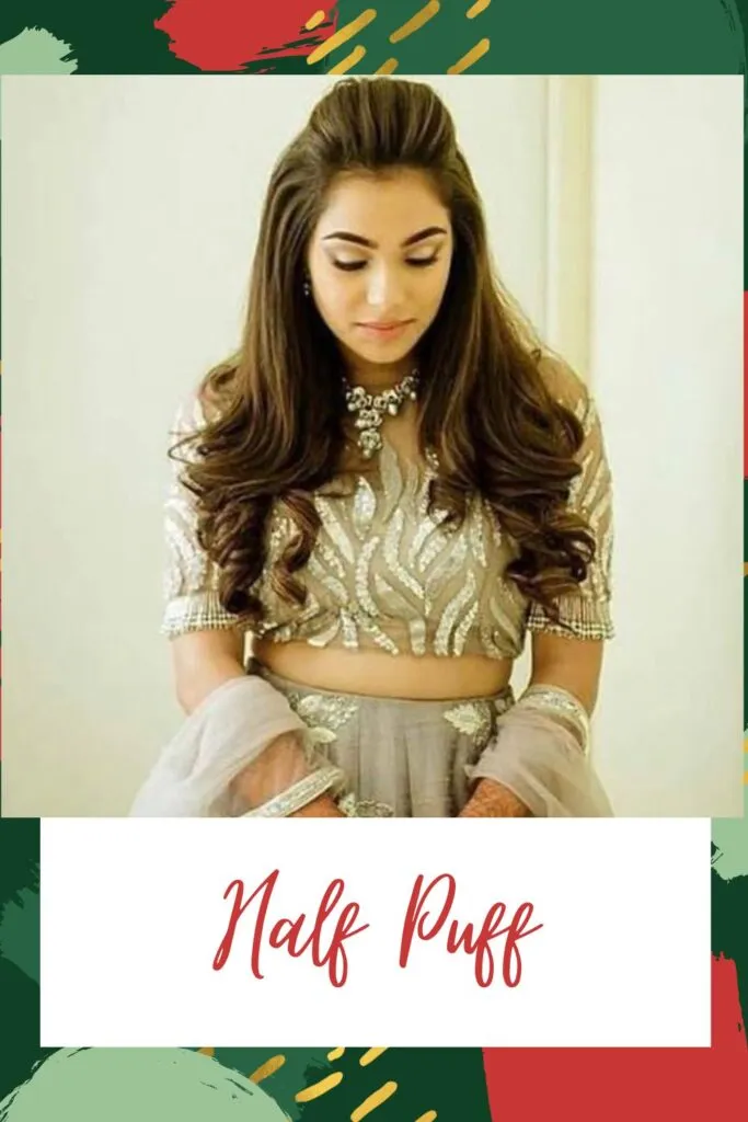 A girl in grey and golden lehenga posing for camera and showing her half puff hairstyle A girl in grey and golden lehenga posing for camera and showing her half puff hairstyle - Indian women hairstyles