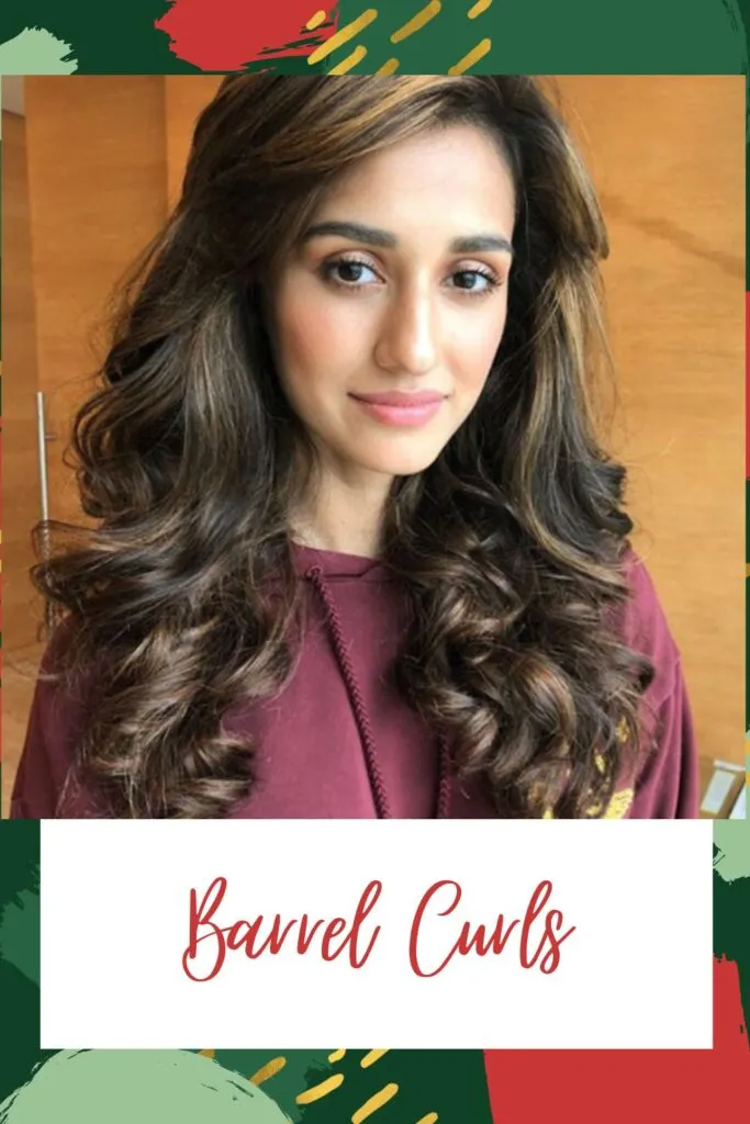 A girl in purple hoodie showing her Barrel Curls A girl in purple hoodie showing her Barrel Curls - haircuts for Indian women