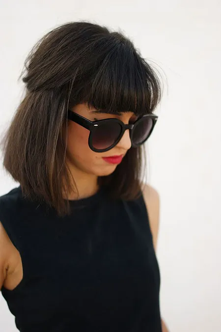 Girl in black cut sleeves top with goggles and Medium Haircut With Bangs Girl in black cut sleeves top with goggles and Medium Haircut With Bangs - hairstyles for ladies medium length