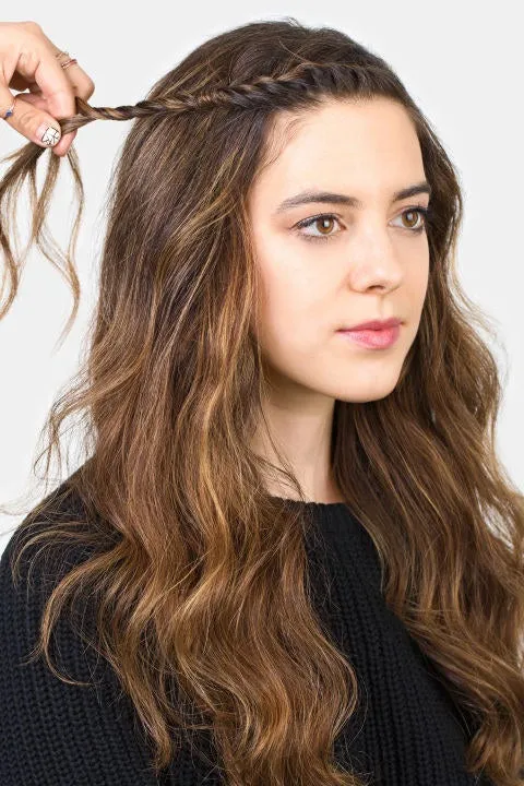 Woman in black sweater and Slight Fringe Twist hairstyle Woman in black sweater and Slight Fringe Twist hairstyle - haircut for straight hair oval face