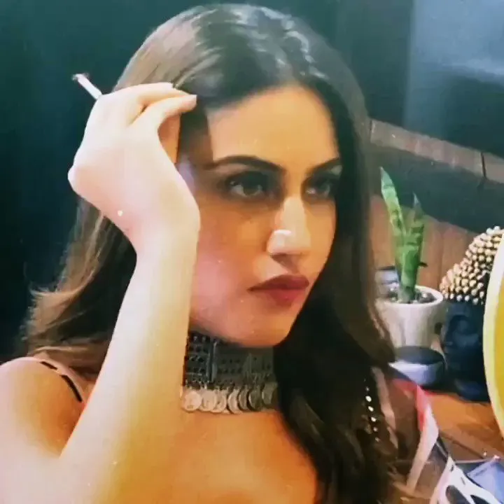 Surbhi Chandna managing her hair and holding a cigarette - indian tv actress smoke 