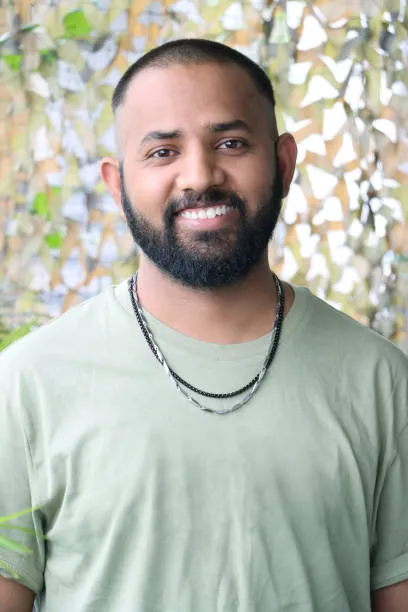 Smiling Mam in grey round neck t-shirt and classic crew cut hairstyle Smiling Mam in grey round neck t-shirt and classic crew cut hairstyle - best haircut for Indian boy