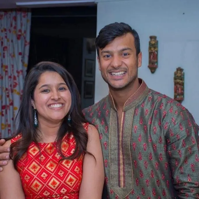 Smiling Mayank Agarwal and Aashita Sood posing for camera Smiling Mayank Agarwal and Aashita Sood posing for camera - indian cricketers wife