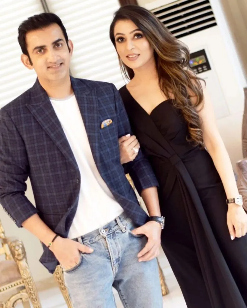 Smiling Gautam Gambhir and Natasha Jain posing for camera Smiling Gautam Gambhir and Natasha Jain posing for camera - indian cricketers wife photos