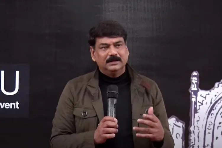 Kamal Khan in brown jacket with black inner holding a mike and saying something Kamal Khan in brown jacket with black inner holding a mike and saying something - indian tv actors who died recently