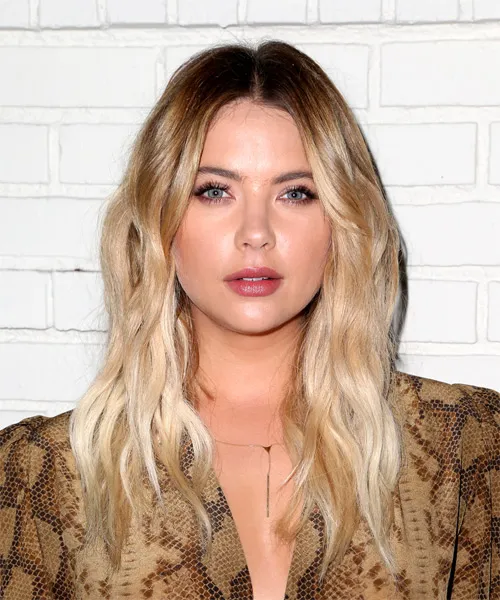 A women in multi color printed top and Medium length with volume and bangs hairstyle A women in multi color printed top and Medium length with volume and bangs hairstyle - hairstyles for girls with medium hair