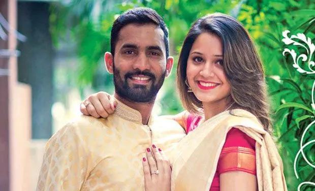 Dinesh Karthik and Deepika Pallikal smiling and posing for camera Dinesh Karthik and Deepika Pallikal smiling and posing for camera - indian cricketers wives and girlfriends