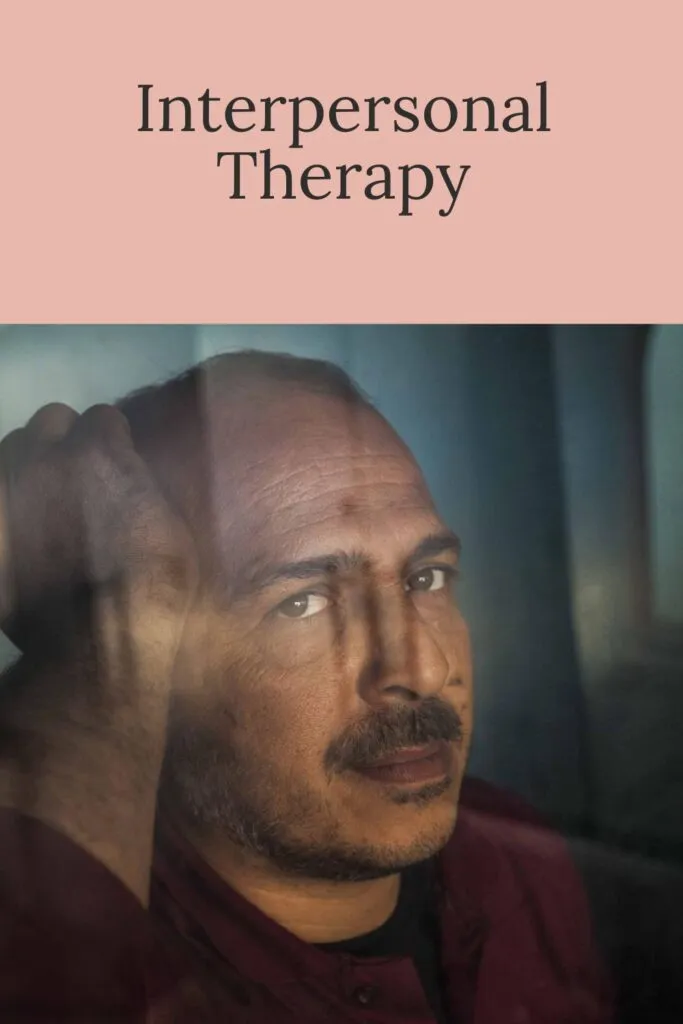 A man in red shirt sitting and think something A man in red shirt sitting and think something - Depression and Anxiety Therapy Sessions