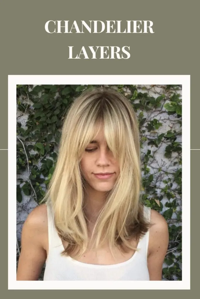 Woman in white tank top with Chandelier Layers hairstyle Woman in white tank top with Chandelier Layers hairstyle - hairstyles for women with thin hair