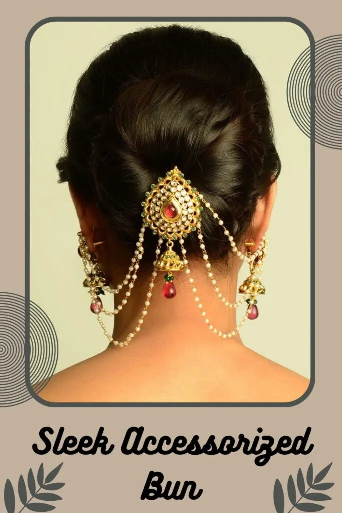 Woman showing the back view of her Sleek Accessorized Bun Woman showing the back view of her Sleek Accessorized Bun - Indian bridal hairstyles for short hair