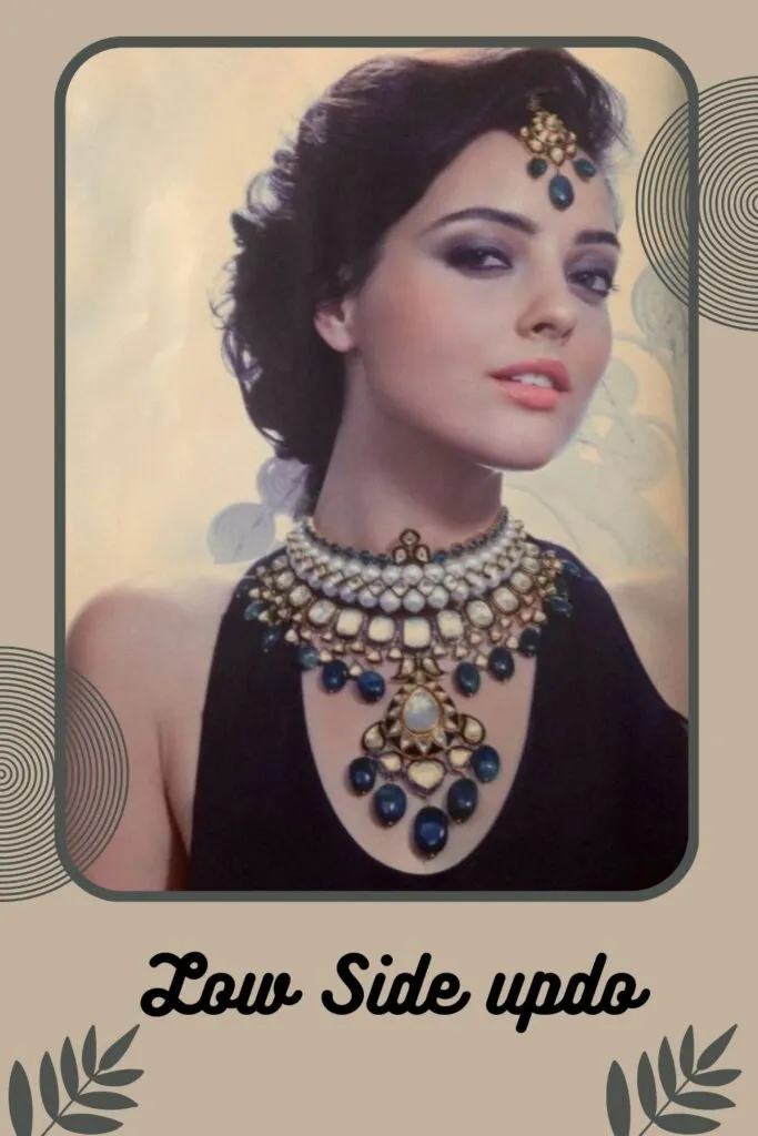 Woman in black cut sleeves dress with heavy necklace and Low Side updo Woman in black cut sleeves dress with heavy necklace and Low Side updo - Indian bridal hairstyles for short hair