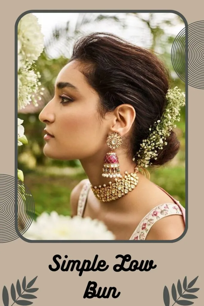 Woman in pink traditional lehenga with matching jewellery and Braided Half Tie Woman in pink traditional lehenga with matching jewellery and Braided Half Tie - Indian bridal hairstyles for short hair